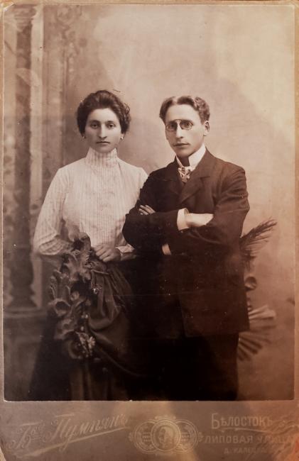 An old black and white photo of a white man and woman in early 20th century European dress